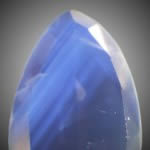 This sapphire has been identified as natural, as visible straight colour-zoning and growth lines meeting at 120 degrees are present