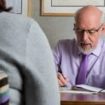 Padraic takes time to fully understand your requirements before starting work. Here, Padraic takes detailed notes as his client explains why she needs a jewellery valuation.