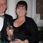 Shirley Mitchell receiving the Valuer of the Year Award from the AIJV