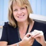 Georgina Deer examining a diamond ring