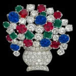 A period diamond, ruby, sapphire and emerald set brooch - Both modern and antique jewelry,  are appraised by this company.