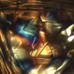 A tension knot in a diamond, when viewed between crossed polarizing filters. Photo courtesy of Alberto Scarani www.scarani.com