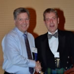 Stuart Robertson (USA) receiving the AIJV Valuer of the Year Award at the AGA Conference in Tucson, US