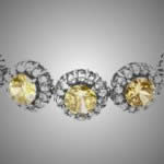 Near-colorless and fancy-colored diamond bracelet. Artabella identify naturally colored and artificially color-enhanced diamonds