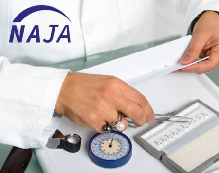 An NAJA member sorting diamonds