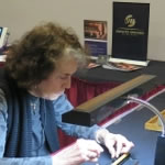 Conference is also an opportunity to have your skills and assets tested. This photo show an NAJA delegate being assessed for color acuity by Independent Certified Color Acuity Technician.