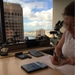 Sandra at work in her downtown Honolulu office.